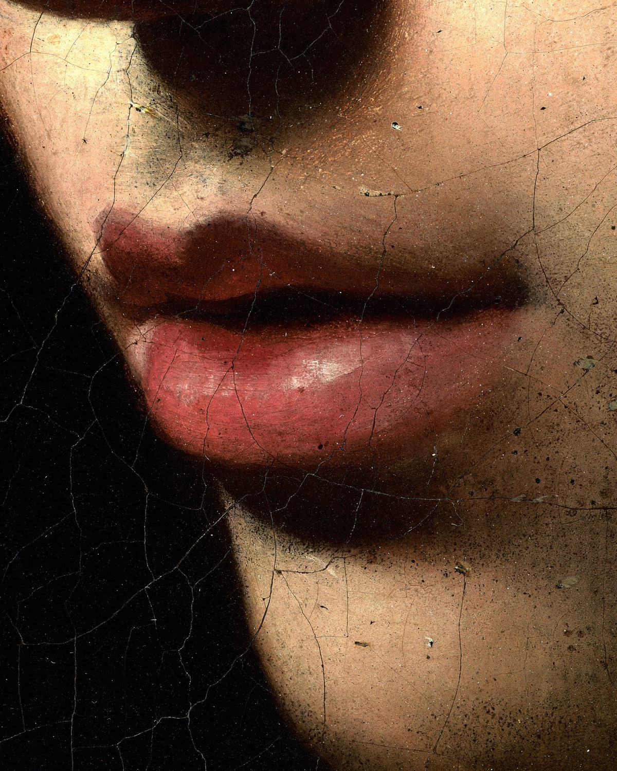Close-up of a Caravaggio painting: softly lit red lips and cheek against a dark background with visible cracks in the paint