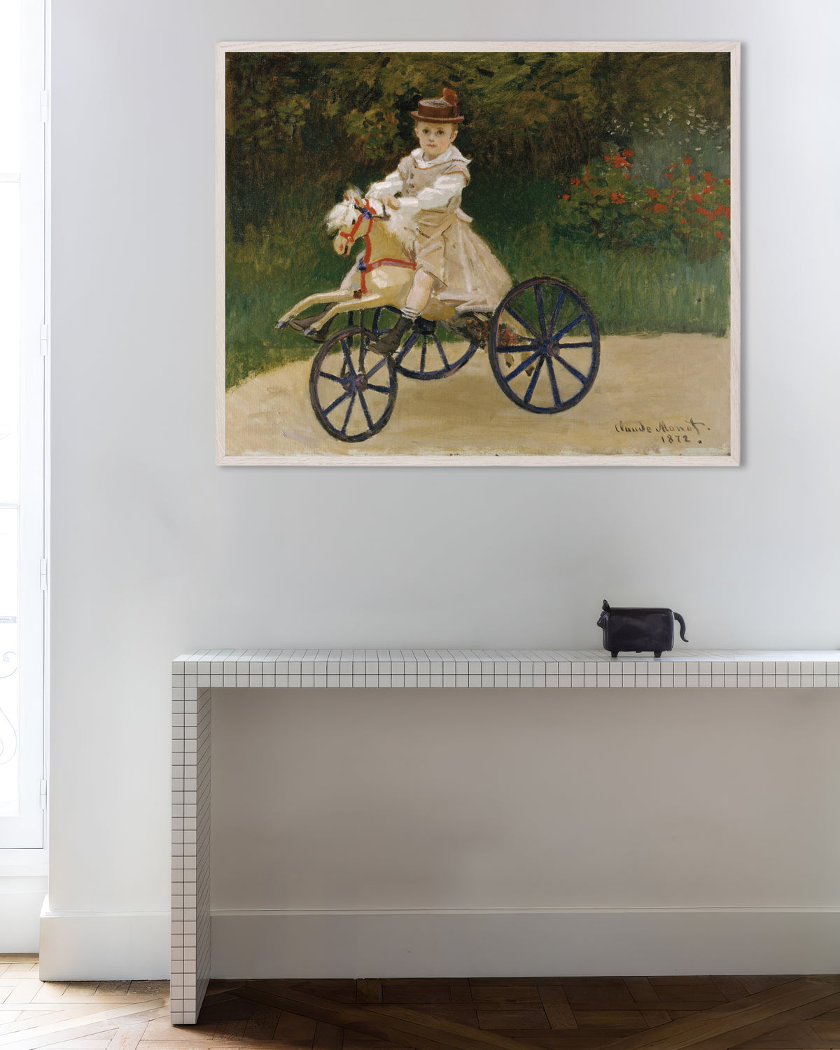 Poster Jean Monet auf seinem Steckenpferd (1872) von Claude Monet mit weißem Holzrahmen