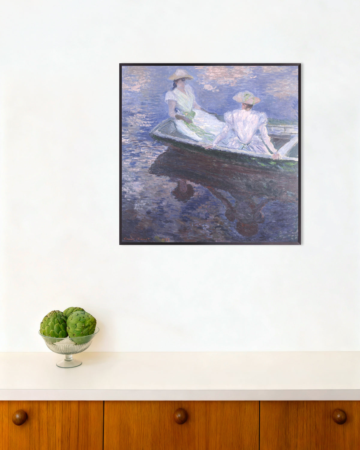Poster Junge Mädchen im Boot (1887) von Claude Monet mit Metallrahmen